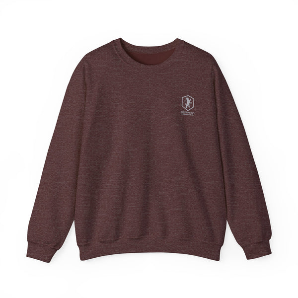 A dark heathered brown crewneck sweatshirt with a small white shield logo on the left chest, displayed flat against a solid white background.